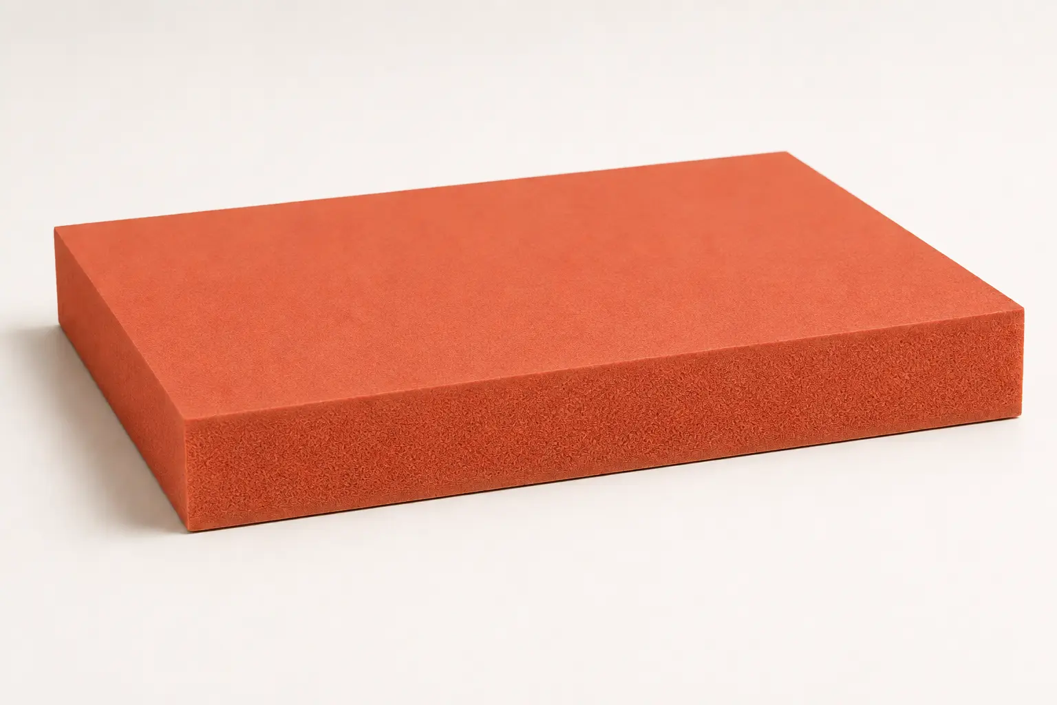 Orange-red fire-retardant MDF slab with colour extending through its fine-fibre core